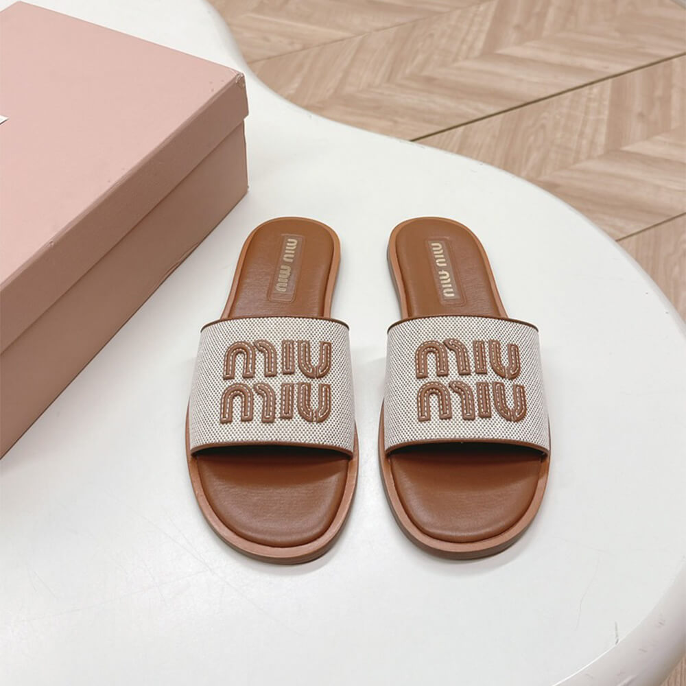 MiuMiu Canvas and leather slides