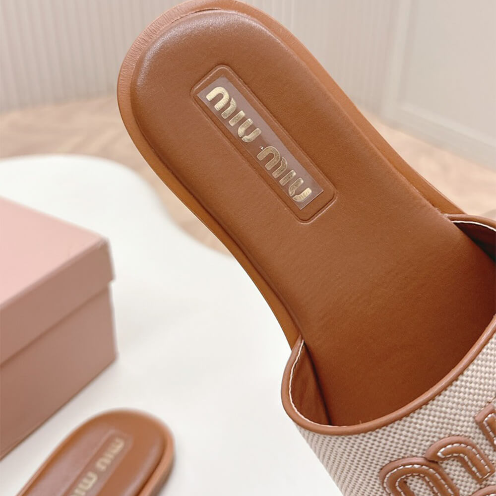 MiuMiu Canvas and leather slides